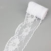 A roll of white decorative lace ribbon, approximately 65mm wide, shown against a light gray background.