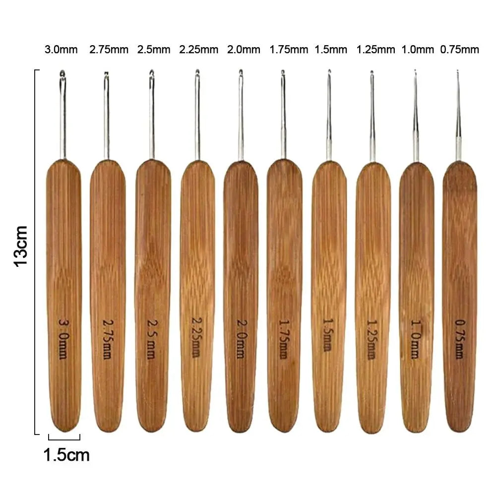A set of ergonomic bamboo crochet and knitting needles in various sizes, ranging from 0.75mm to 3.0mm.