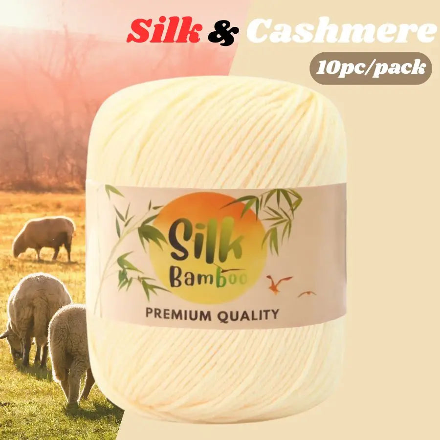 A ball of cream colored silk and cashmere yarn labeled Silk Bamboo Premium Quality