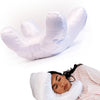 A white satin anti-wrinkle pillow is shown being used by a woman sleeping.