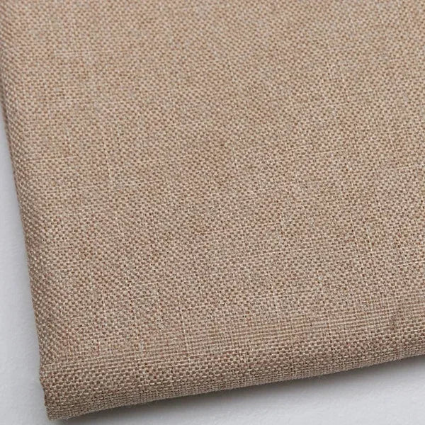 Close-up texture of beige coarse linen and cotton fabric for DIY projects