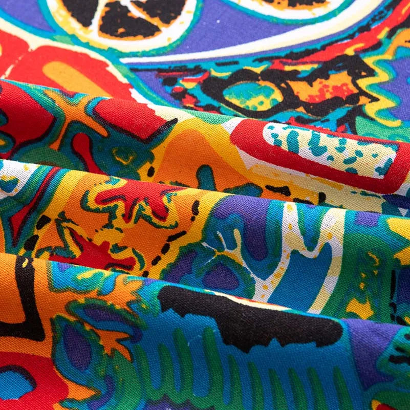 Close-up of colorful bohemian printed linen fabric showing various patterns and folds.