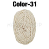 A ball of cream colored soft velvet chenille yarn labeled Color-31 for crafting.