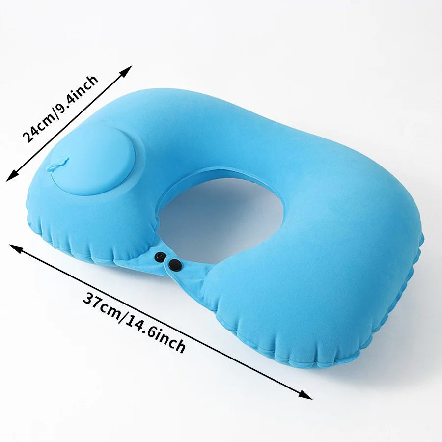 Light blue inflatable neck pillow with measurement lines showing its size.