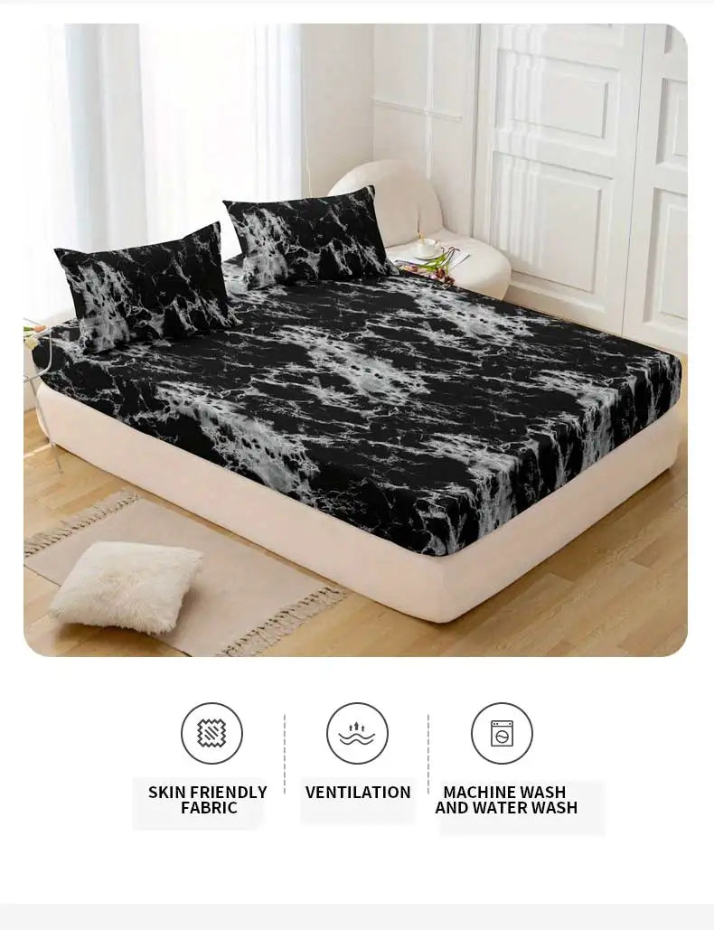 Black and white marble print fitted sheet set with pillowcases displayed on a bed.