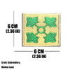 A square embroidered tactical patch in green on a beige fabric with a hook and loop backing.