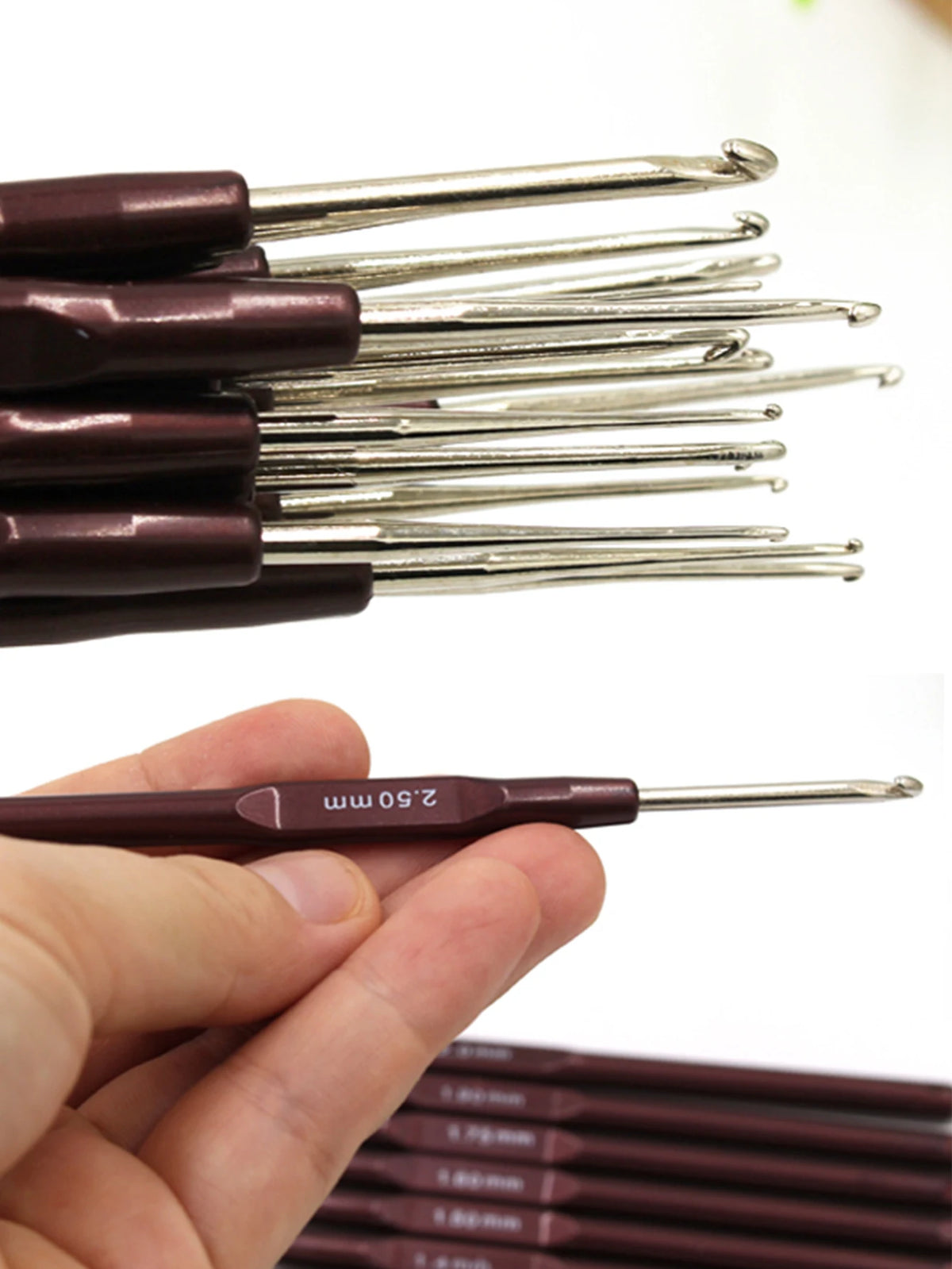 A hand holds a set of 16 ergonomic crochet hooks with soft-grip handles, showing the size and color.