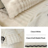 A white rabbit plush long pillowcase is shown on a bed, featuring quilted texture and soft fur.
