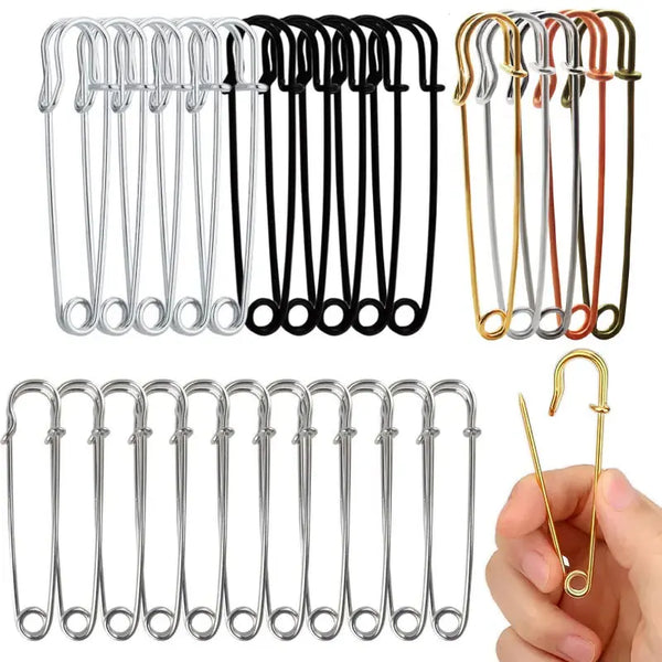 A collection of heavy duty stainless steel safety pins in various sizes and finishes.