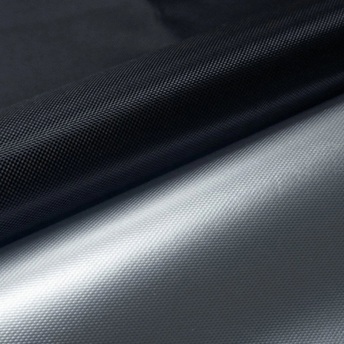 Blackout curtains with adhesive strips shown in a rolled, textured fabric.