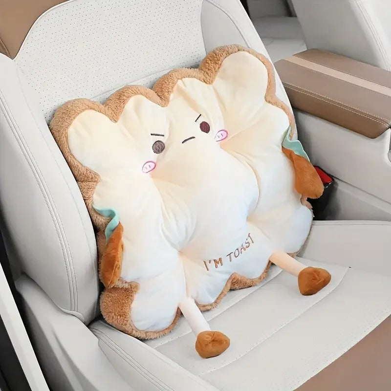 A plush cartoon toast shaped seat cushion for back and fatigue relief placed in a white car seat.