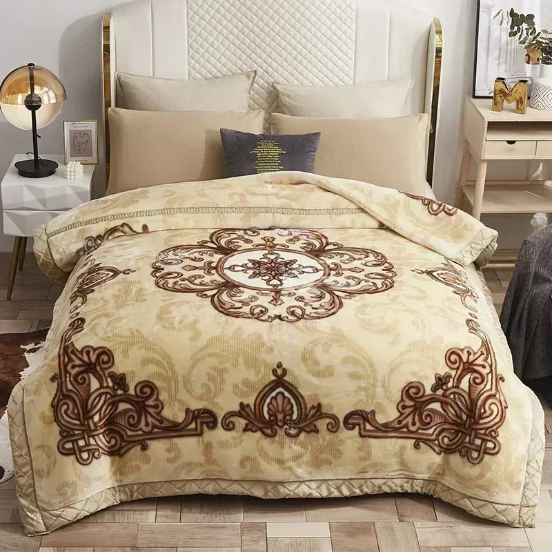 A beige weighted blanket with intricate brown floral patterns is displayed on a bed.