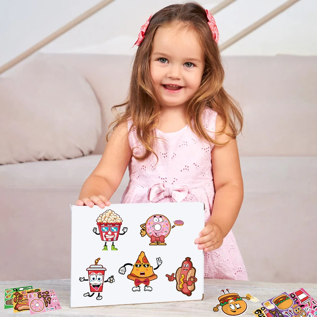 A smiling young girl holds a sheet of stickers featuring various food-themed faces and characters.