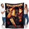 A movie poster featuring a dramatic close-up of a man in a dark outfit with fiery background and the title Halloween