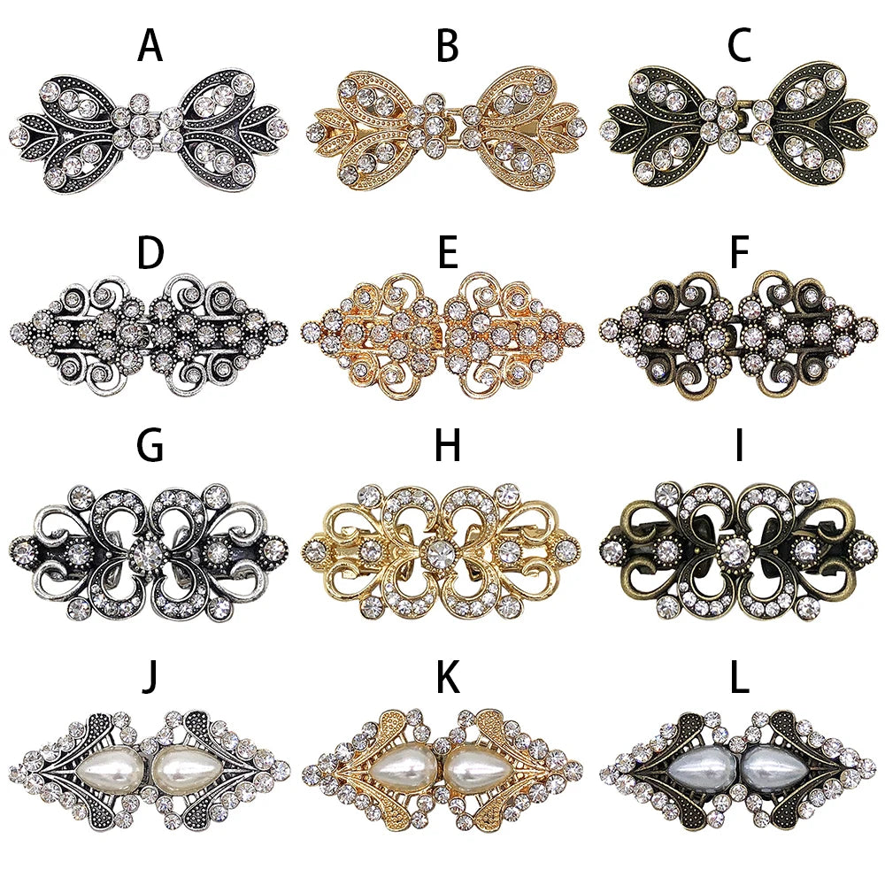 A collection of twelve vintage swirl clip brooches featuring silver, gold, and antique finishes.