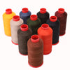 A collection of heavy duty nylon sewing thread spools in various colors including yellow, blue, green, black, and red.