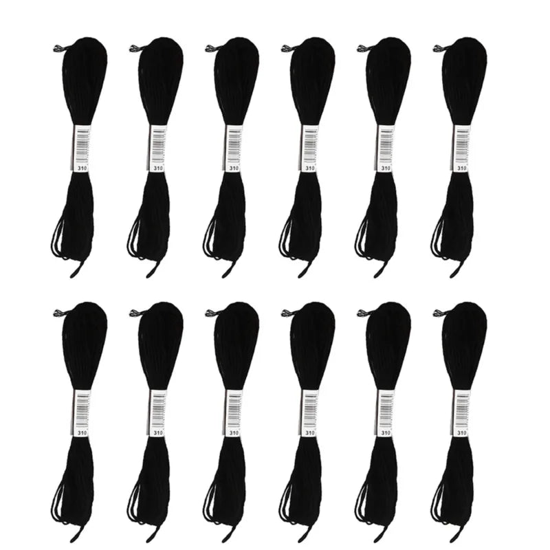 A set of embroidery floss in white and black craft thread shown in various colors.
