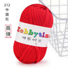 A ball of bright red thick polyester craft yarn labeled as Hobbytime yarn for knitting and crochet.