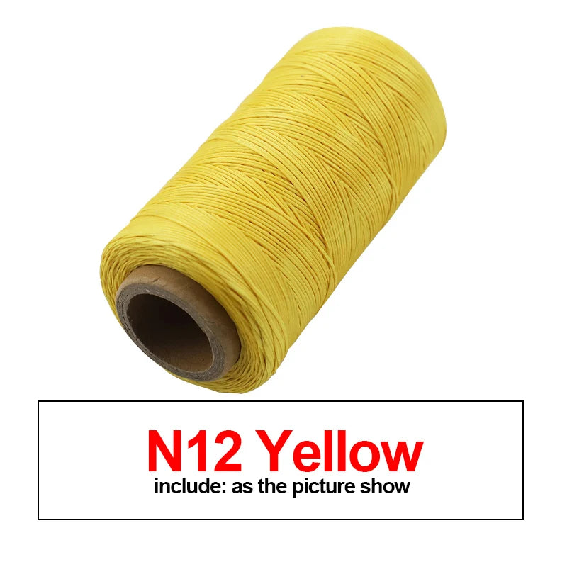 Yellow N12 waxed thread rolled on a spool for leather and crafting