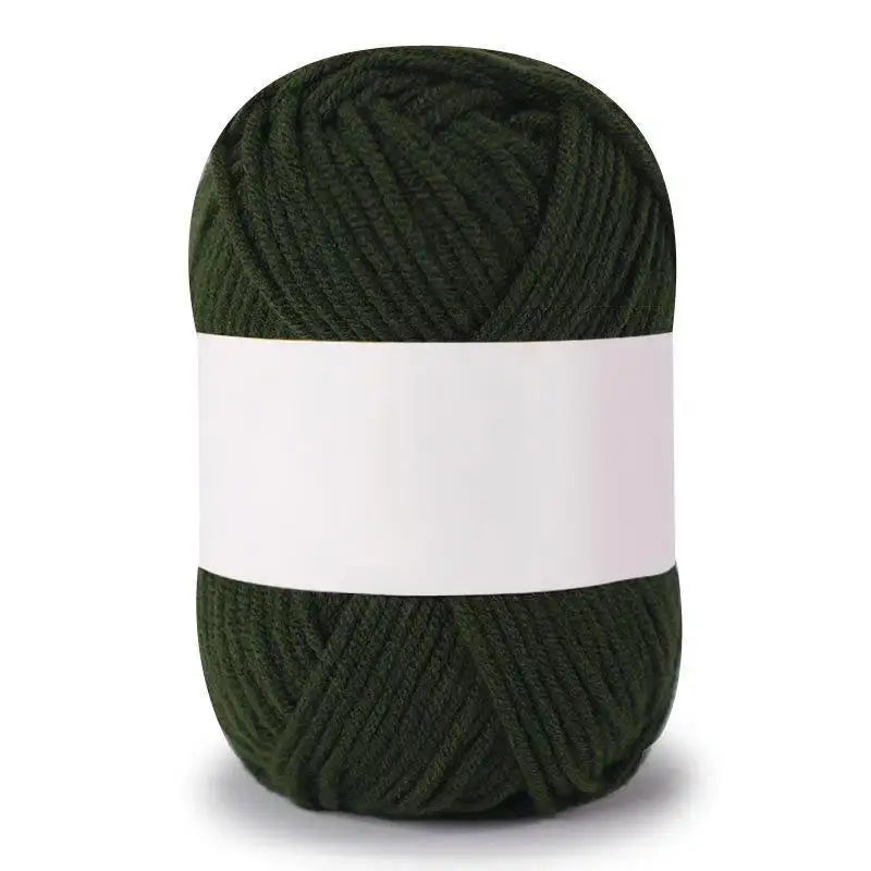 A ball of dark olive green soft milk cotton knitting yarn with a white band around the middle.
