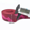 A roll of magenta camouflage elastic stretch ribbon with a measuring tape attached.