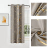 Taupe curtains with a gold marble pattern hanging on a rod.