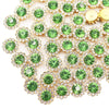 A close-up of sunflower crystal rhinestone sew-on buttons in green and gold tones.
