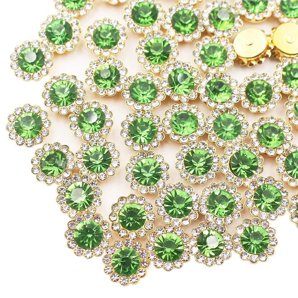 A close-up of sunflower crystal rhinestone sew-on buttons in green and gold tones.