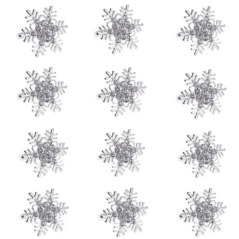 A collection of silver glitter snowflake napkin rings for table decoration.