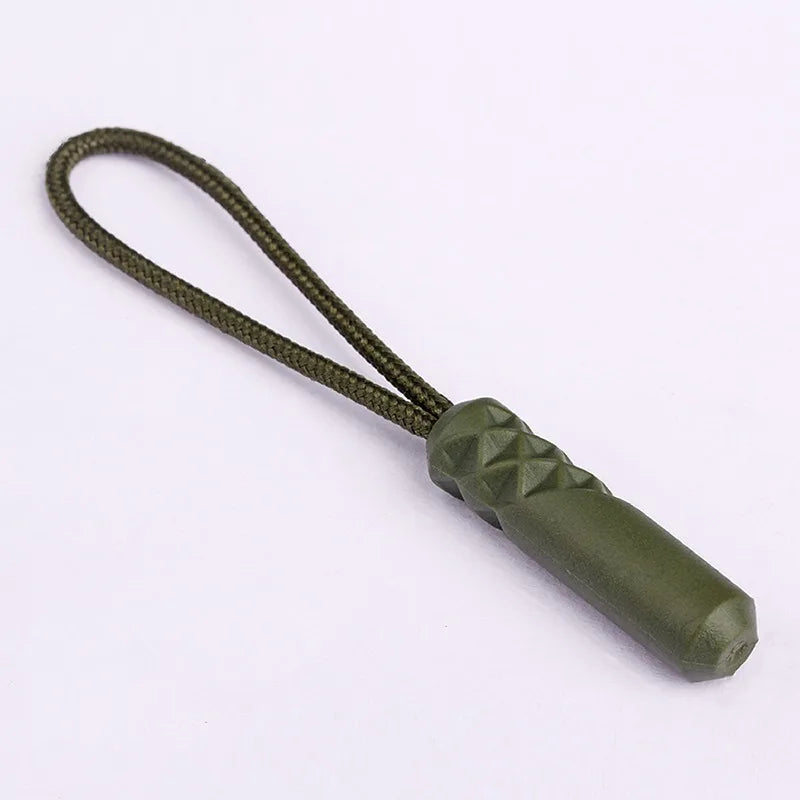 A close-up view of a dark olive green zipper pull replacement clip with a braided cord.