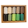 A box containing four spools of 10-color polyester sewing thread in various shades of beige and green.