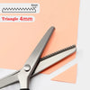 Professional stainless steel tailor's shears with a triangle-shaped opening shown next to colored paper.