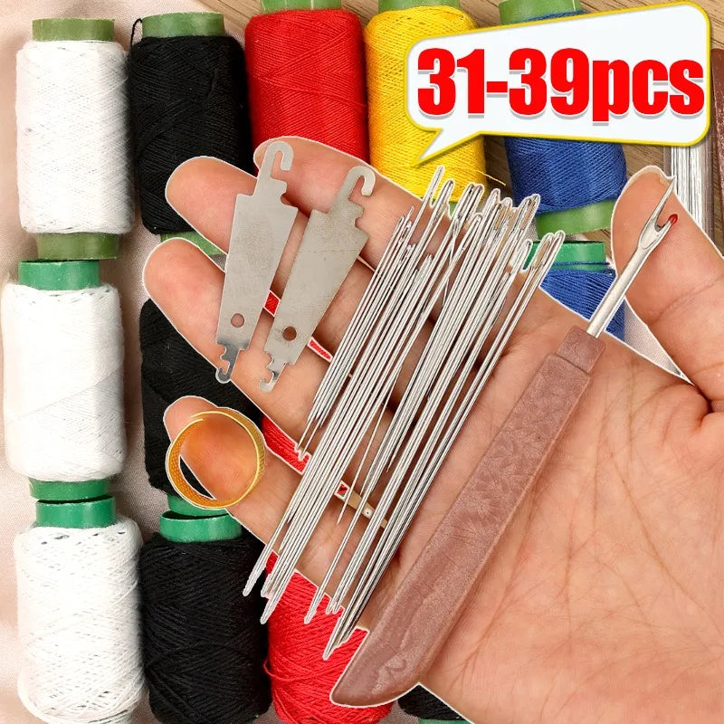 A hand holds a portable sewing needle kit with multiple silver needles and a small knife, surrounded by spools of colored thr
