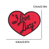 Red heart shaped embroidery patch with the text I Love Lucy embroidered in black script