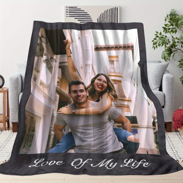 A dark blanket featuring a photo of a happy couple smiling and embracing, with the text Love Of My Life printed on it.