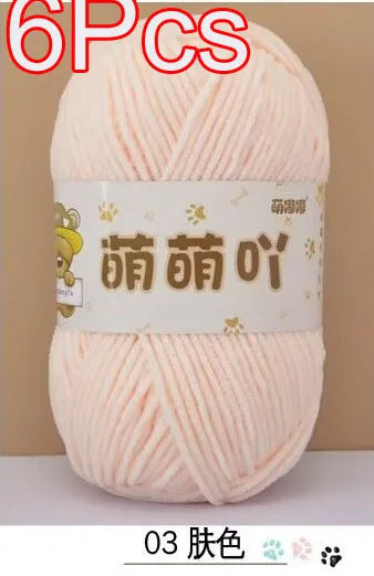 A skein of pink chenille yarn labeled 03 Pink, ready for crochet and knitting projects.