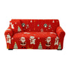 A red festive sofa cover featuring Christmas and winter-themed characters and decorations.