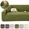 A collection of stretch jacquard sofa slipcovers in various shades of olive green and beige.