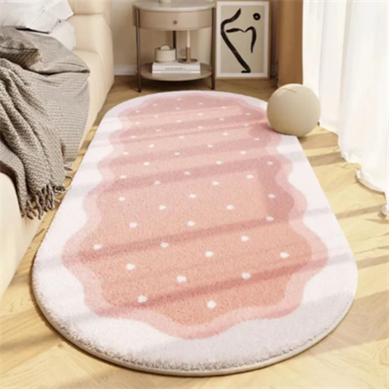 A pink and white striped seasonal decor rug placed on a light wooden floor next to a sofa.