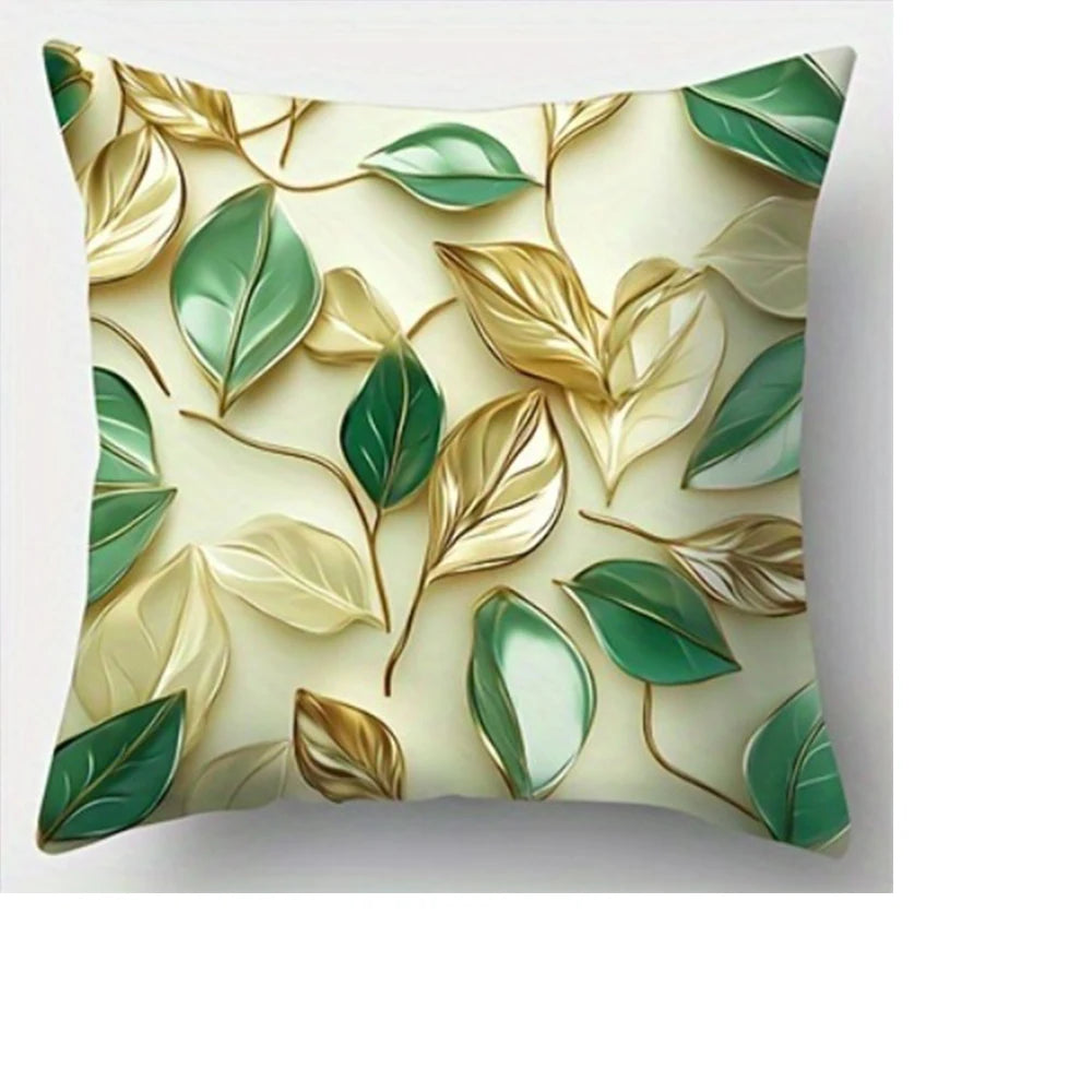 Decorative pillowcase featuring a botanical print of gold and green leaves on a cream background.