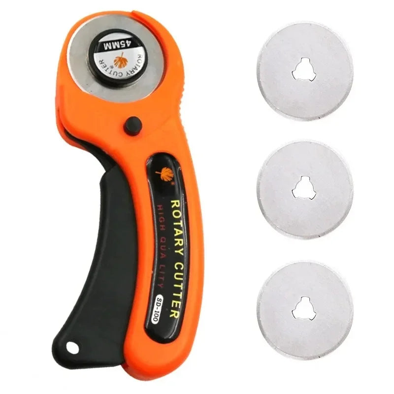 Orange rotary cutter kit with six silver blades and a black handle