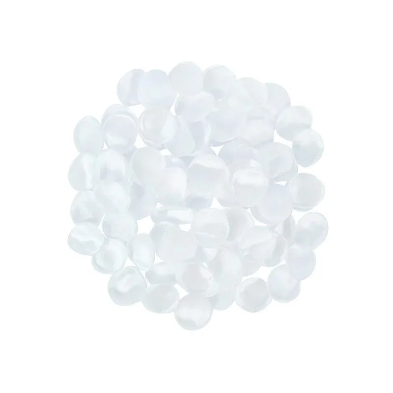 A pile of white silk rose petals for weddings and events.