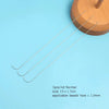 A set of three stainless steel beading needles with a wooden holder are displayed on a light blue background.