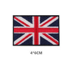 A rectangular embroidered patch featuring the Union Jack design in red, white, and blue threads.