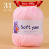 A skein of 31 soft pink yarn, labeled as handmade knitting thread, is shown on a light background.