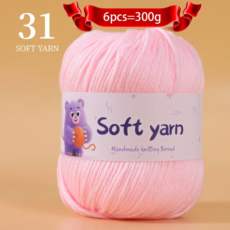 A skein of 31 soft pink yarn, labeled as handmade knitting thread, is shown on a light background.