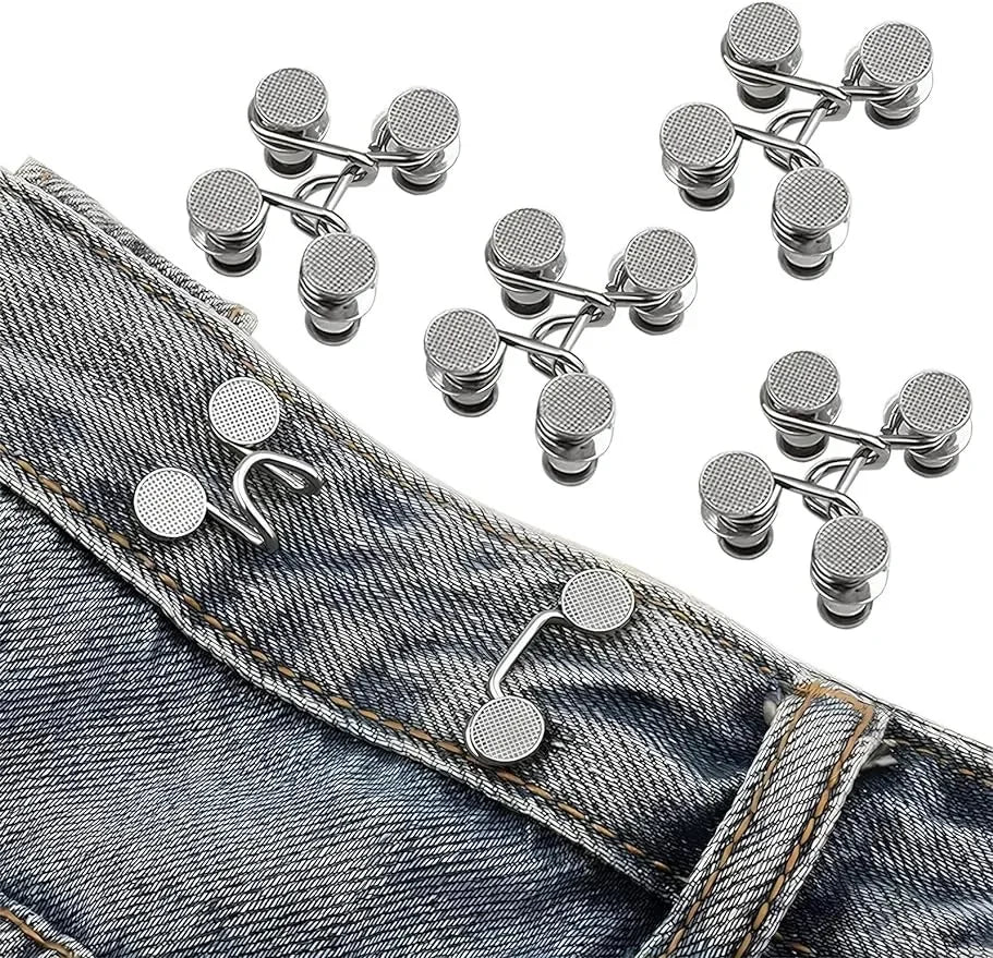 Adjustable button pins for jeans showing various sizes and styles on a denim fabric