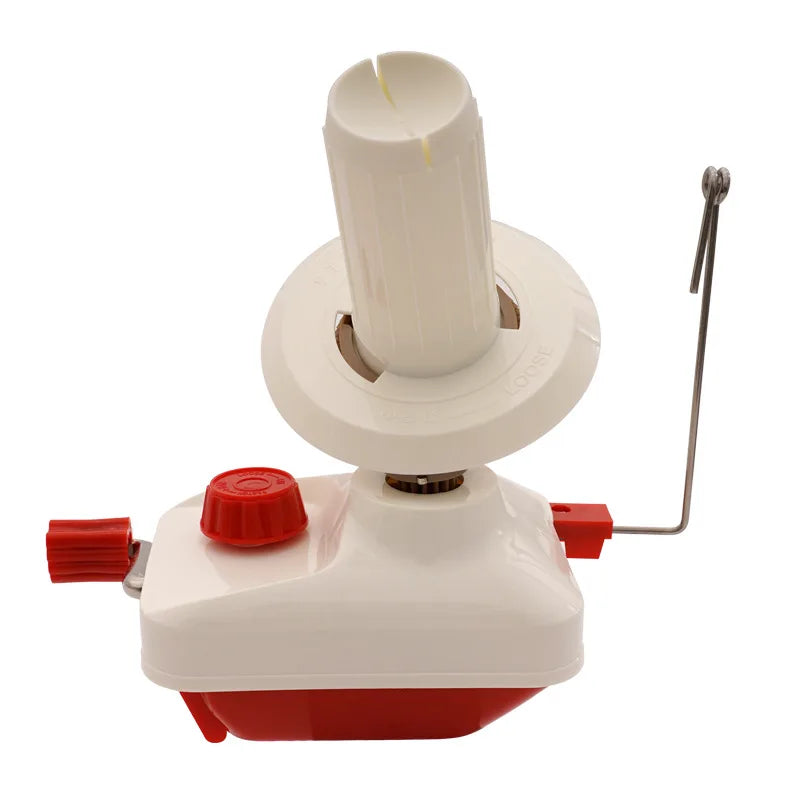 A white hand operated wool yarn winder with a red base and a metal spindle.