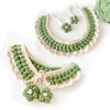 Green and cream knitted crochet headband featuring floral accents made from soft milk cotton yarn