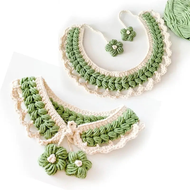 Green and cream knitted crochet headband featuring floral accents made from soft milk cotton yarn